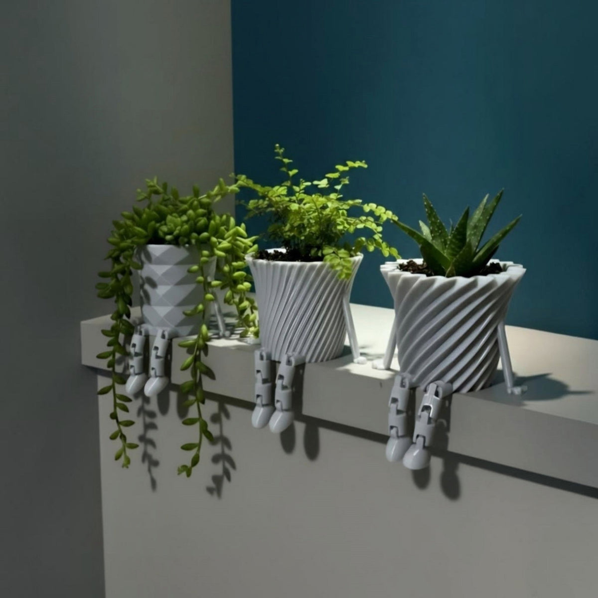 Sitty Planters, 3D-printed planters with legs by nFusion